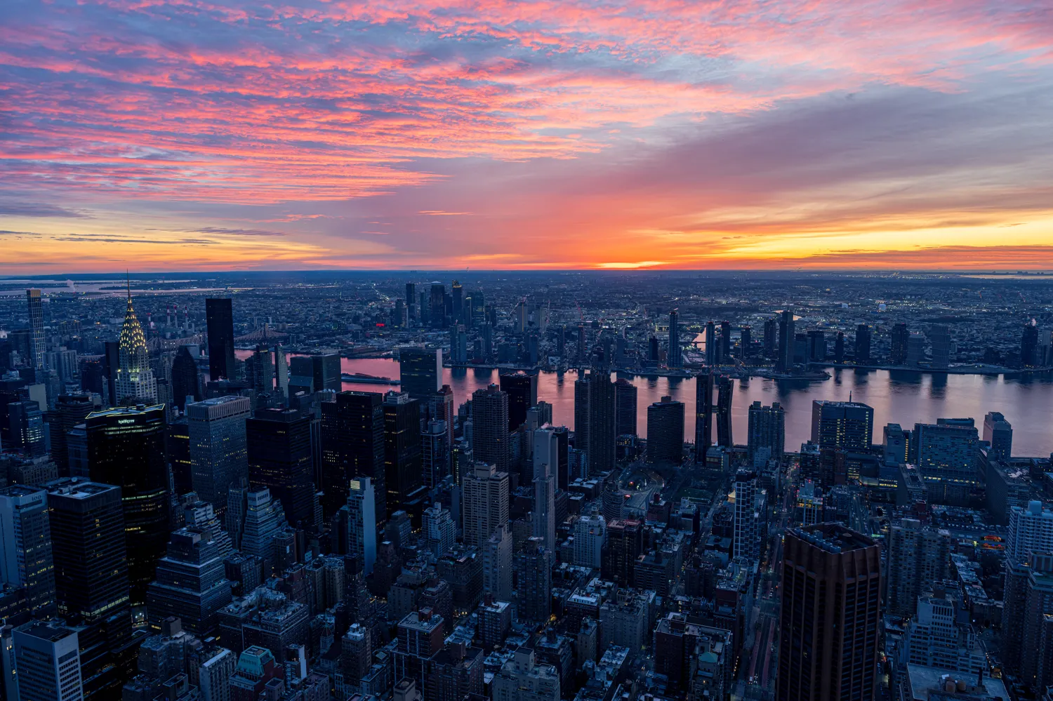 Looking east to the sunrise from the top of the Empire State Building.