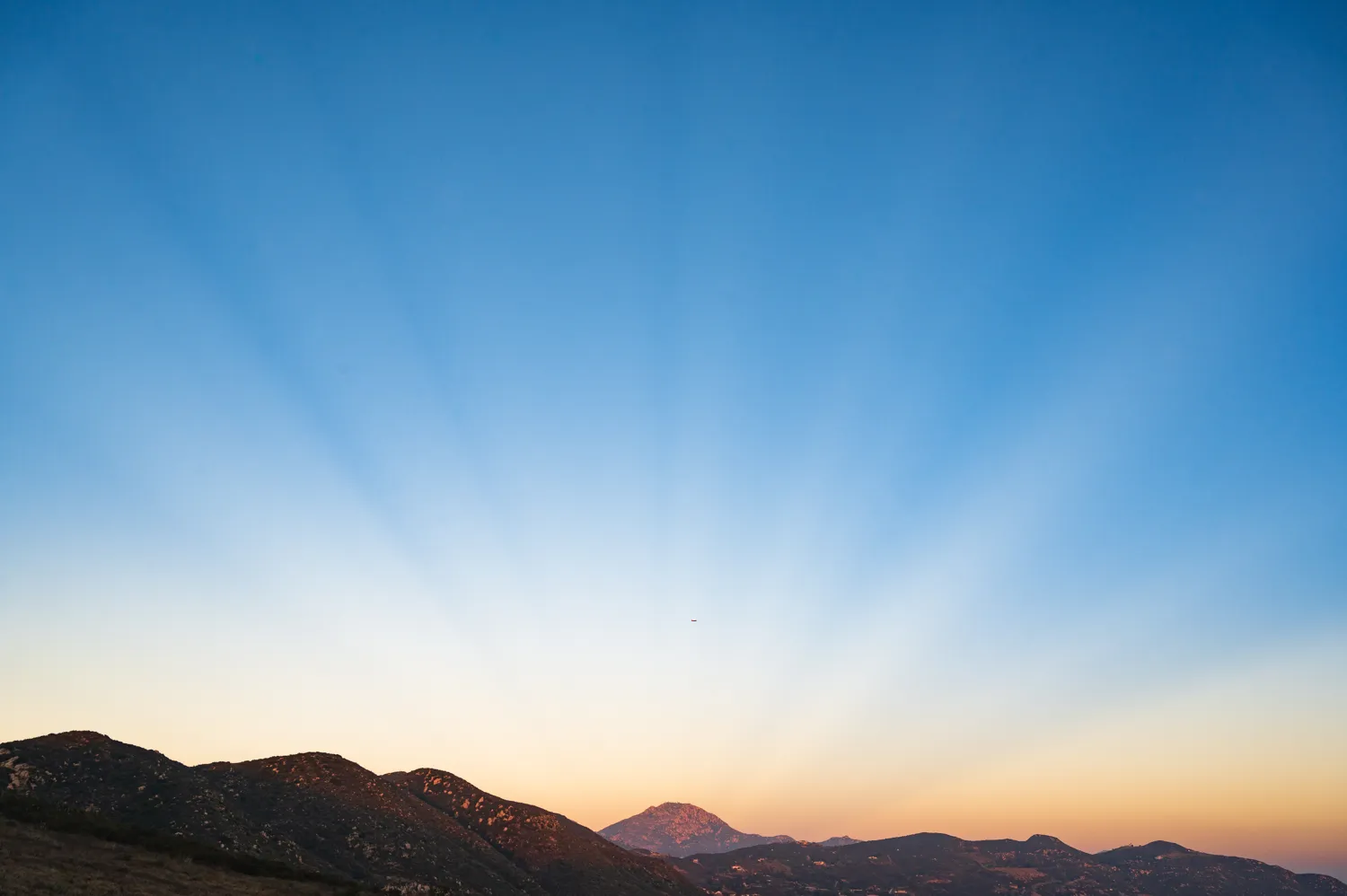 Anti-crepuscular rays over Lyons Peak.